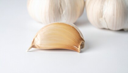 Garlic Cloves on Isolated White Background – Fresh Bulbs with Papery Skin and Natural Macro Focus