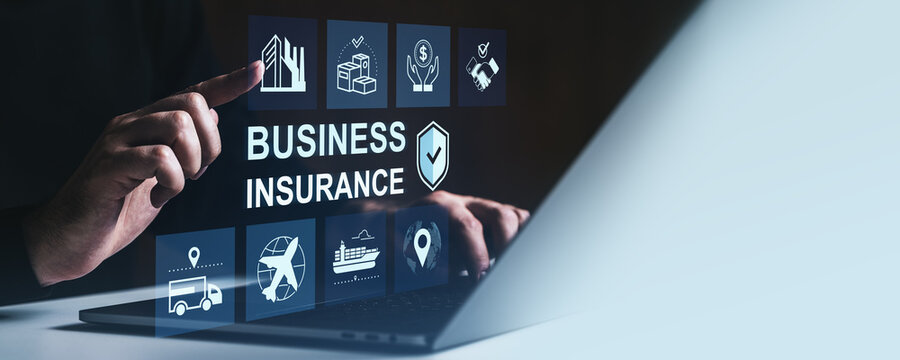 Business insurance concept with digital protection icons and man interacting with virtual interface on laptop screen in modern office environment.