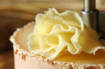 Swiss cheese specialty: rosette of Tete de Moine - (macro, shallow DOF)