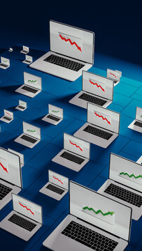 Laptops showing fluctuating stock trends
