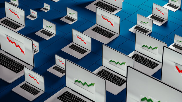Laptops showing fluctuating stock trends