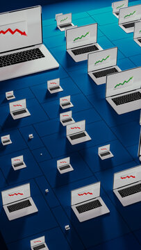 Laptops showing fluctuating stock trends