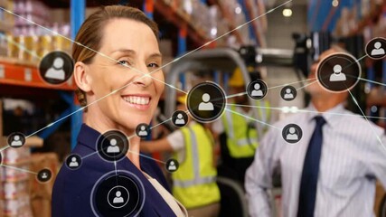 Business manager standing in warehouse starting network overlay with user icons enhancing logistics - Powered by Adobe