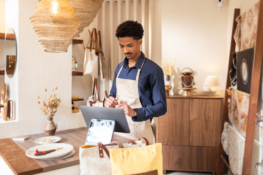 Customer service in a stylish bag store
