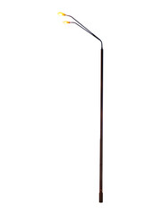 Urban street light with two yellow lamps is isolated.