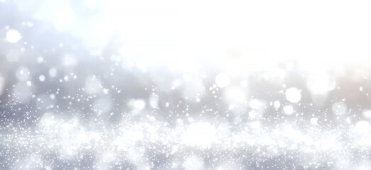 Fototapeta premium Abstract background with bokeh effect featuring sparkling particles and soft light ideal for celebration and festive designs