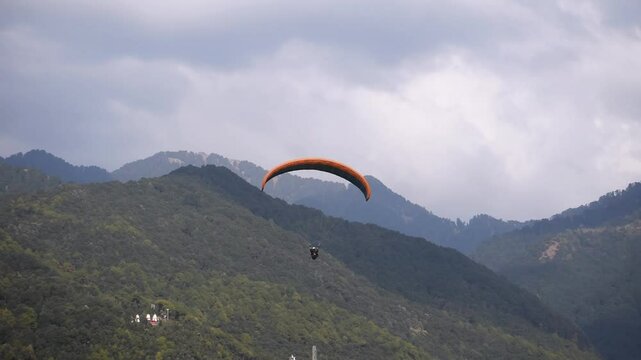Paragliding at Bir Billing Himachal Pradesh India 2. 30 pm 10 January 2025 filmed from underneath. 4k high resolution footage.
