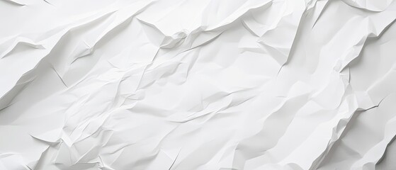 Obraz premium Crumpled white paper texture with soft, irregular folds