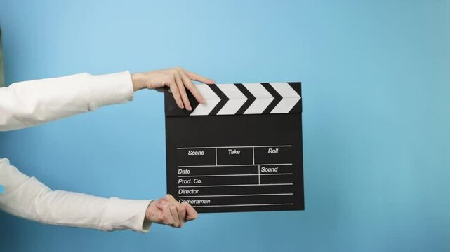 Clapboard in use, cinematography workflow, start of a film take in the entertainment industry