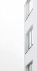 Obraz premium Minimalist view of a section of a white apartment building