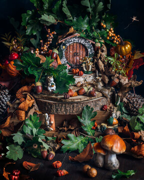 Enchanting miniature fairy forest scene with acorns