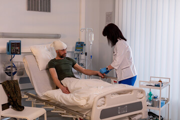 Dedicated Nurse Providing Compassionate Care and Support to Patient in Hospital Room