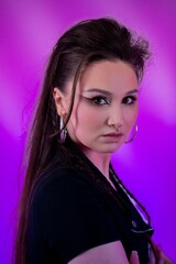 A Stylish Portrait of a Confident Woman with Dramatic Lighting and Bold Accessories