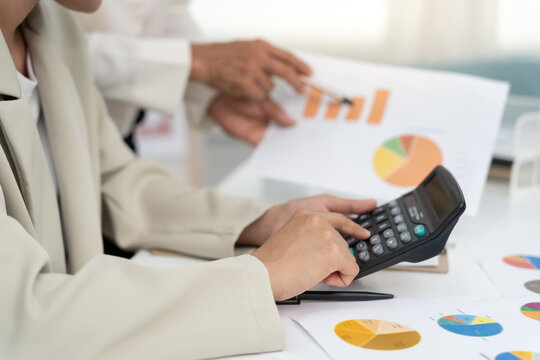 Business team calculate benefit, working woman, spreadsheets, graph financial development, bank accounts, statistics, economy, data analysis, investment analysis, stock exchange, rates income