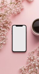 Smartphone on a pink surface surrounded by small pink flowers and a coffee cup