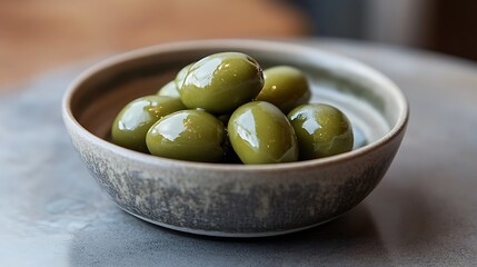 Green Olives in a Ceramic Bowl
