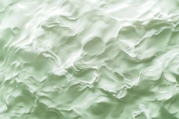 Obraz premium Abstract textured surface of light green cream