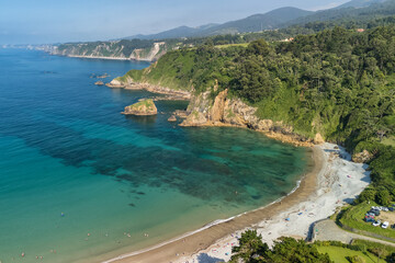 Obraz premium Aerial view of a beautiful Playa de Cadavedo beach, Asturias in northern Spain.