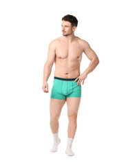 Fototapeta premium Young man in stylish turquoise underwear on white background