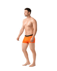 Fototapeta premium Young man in stylish orange underwear on white background