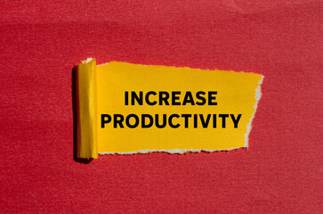 Increase productivity message written on ripped torn yellow paper on red background. Conceptual increase productivity symbol. Copy space.