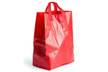 A vibrant red reusable shopping bag stands upright on white background