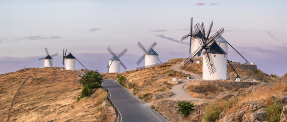Panorama view of the historic windmills of Consuegra at sunrise, Castilla-La Mancha, Spain
