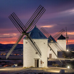 Historic windmills of Consuegra at twilight, Castilla-La Mancha, Spain.