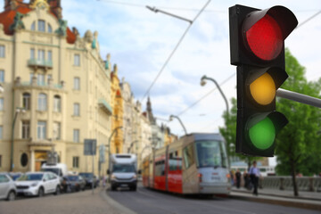 Traffic lights on city street. Signaling device