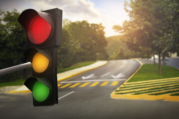 Traffic lights on empty road. Signaling device