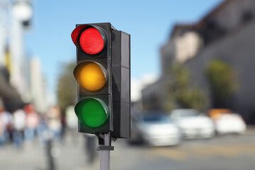 Traffic lights on city road. Signaling device