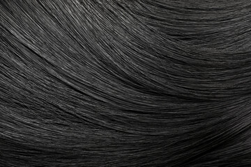 Beautiful shiny black hair as background, top view