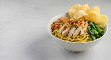 Delicious Chicken Noodle Soup with Crispy Crackers and Bok Choy