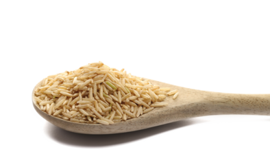 Basmati rice uncooked in wooden spoon isolated on white, side view