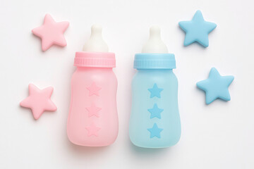 Pink, blue baby bottles with star decor, on white background. Baby shower concept with toy stars. Twins announcement. Newborn arrival. Girl boy twins celebration. Cute, adorable happy birth message