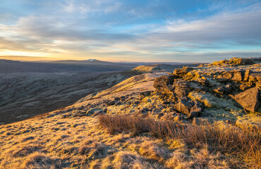 Ingleborough in the distance with Great Coum in the foreground at dawn in the Yorkshire Dales, UK