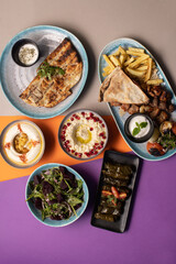 Traditional Lebanese mezze and grill platter with colorful, vibrant presentation.