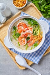 Rice porridge with shrimp ,homemade rice soup with shrimp in a white bowl
