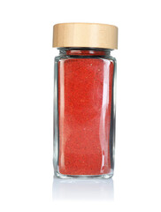 Red pepper powder in spice jar isolated on white