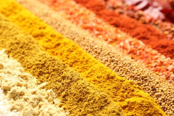 Many different spices as background, closeup view