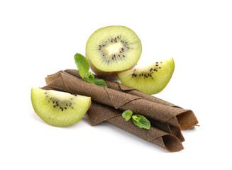 Tasty fruit leather rolls, kiwi and mint isolated on white