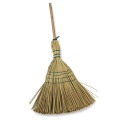 Traditional straw broom with wooden handle against a clean white background studio shot