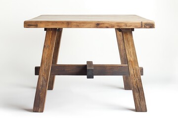 Simple, rustic wooden table with a square tabletop and exposed wooden legs.  The table's structure is built with strong, thick beams, exhibiting a natural wood grain and varied tones