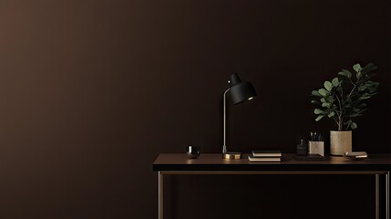 Dark brown office desk with a black lamp and plants.