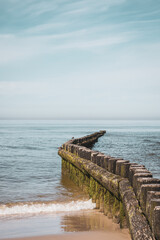 Fototapeta premium Wooden Groynes on Wangerooge – Coastal Protection in the North Sea