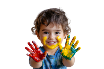 Happy toddler boy with paint-covered hands showing colorful palms and cheerful yellow smile, isolated on a transparent background