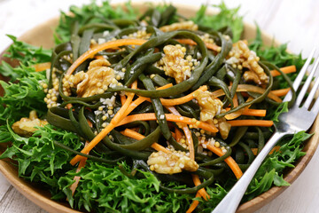 A delicious seaweed salad with sea spaghetti as the main ingredient.