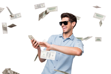 Photo of cheerful excited ecstatic overjoyed man throwing money away showing his wealthiness wearing denim isolated over grey color background
