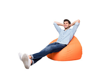 Turned full length body size photo of cheerful confident relaxing man sitting in chair thinking...