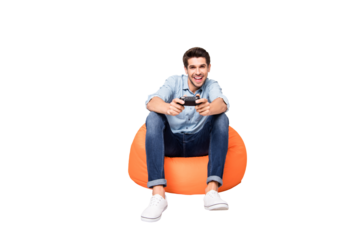 Full length body size photo of trendy man addicted to playing video games wearing white sneakers holding joy stick with hands isolated over grey color background